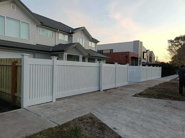 Modern fencing solutions featuring secure boundary design and timber panels for an Australian home