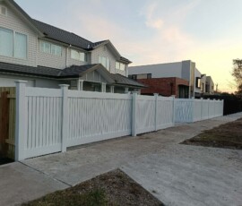Modern fencing solutions featuring secure boundary design and timber panels for an Australian home